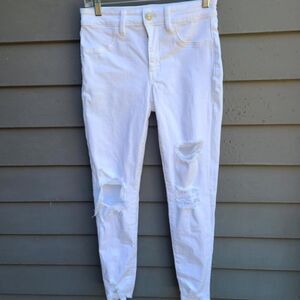American Eagle White Next Level Stretch Distressed Jeans Frayed Hems size 6